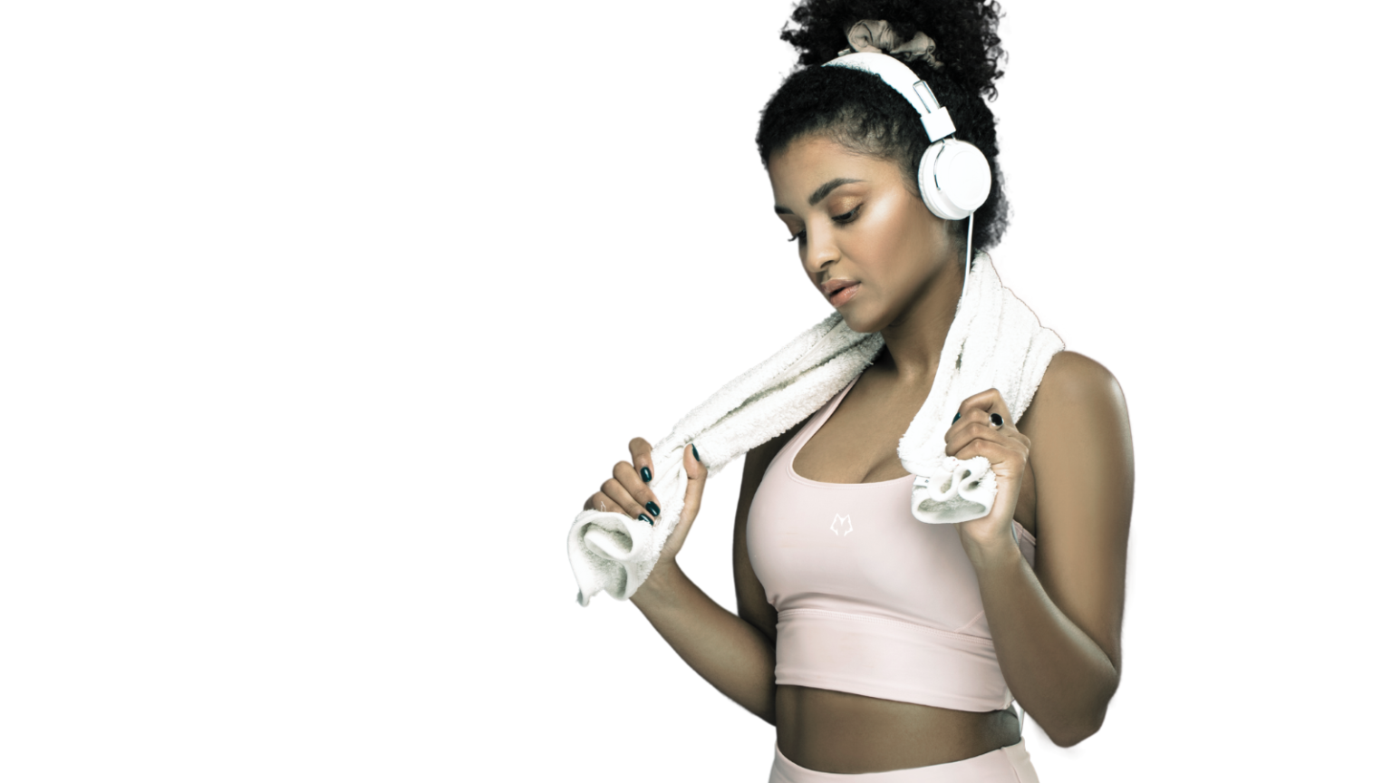 Woman with headphones and towel